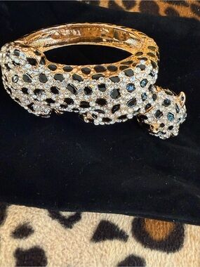 Gold – tone, rhinestone, and enamel, leopard clamper bracelet
